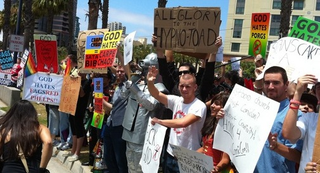 Illustration for article titled The SDCC "God Hates Fags" counterprotest had the best, nerdiest signs ever